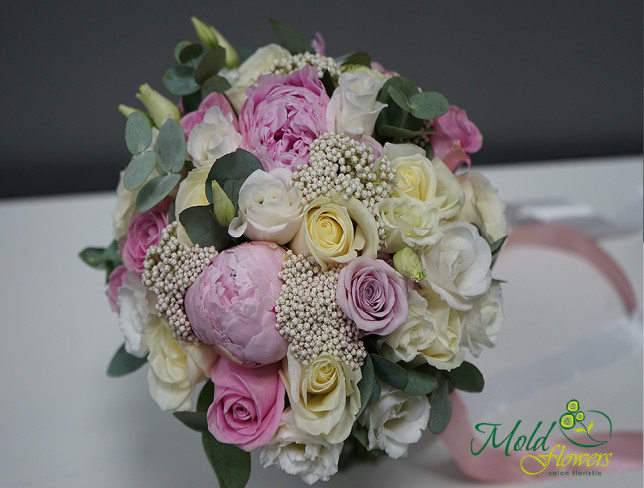 Bridal bouquet with pink roses, peonies, and white eustoma photo